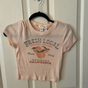 Tilly’s graphic baby tee
